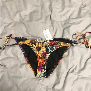 Out from under cinched bikini bottom